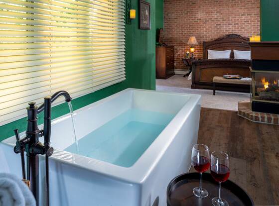 The Yellow House on Plott Creek Road allows check-in for 18 year-old guests