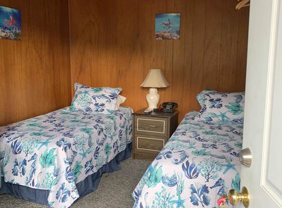 Curley's Resort & Dive Center allows check-in for 18 year-old guests