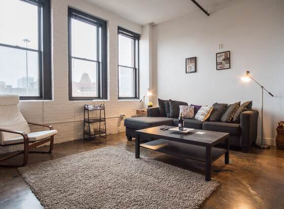 FRONTDESK Atelier Apts Third Ward Milwaukee allows check-in for 18 year-old guests